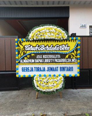 Papan Bunga Duka di Minomartani